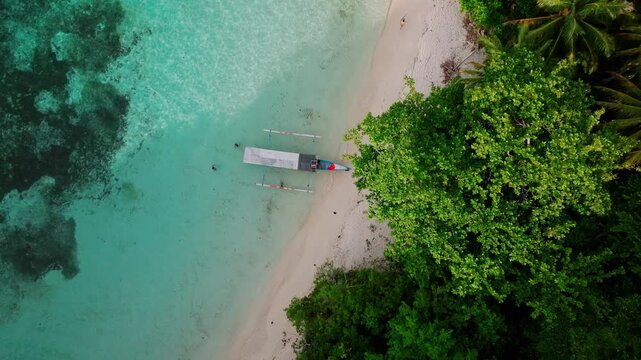 Drone Footage Over Karina Beach with Coral Reef &ndash; Scenic Coastline Togean Island Indonesia