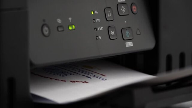 Printer hums, paper feeds steadily. Green lights blink, signaling progress. Buttons glow under soft ambient light. Paper emerges, crisp and printed. Perfect for office, tech, or home use