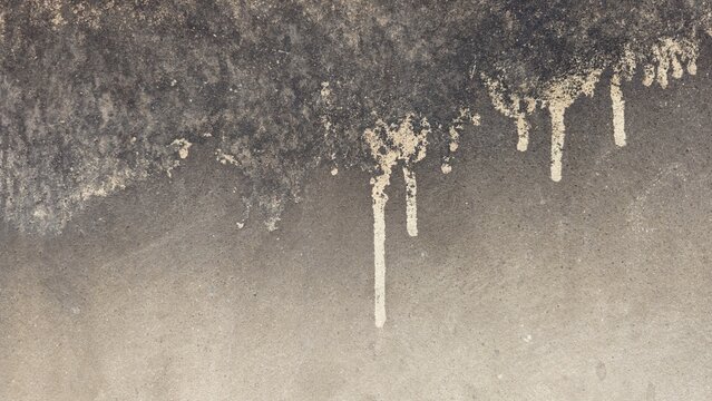 Vintage grunge background with hanging drip texture and dusty overlay, abstract old wall pattern. Abstract gray concrete wall texture background with rough surface