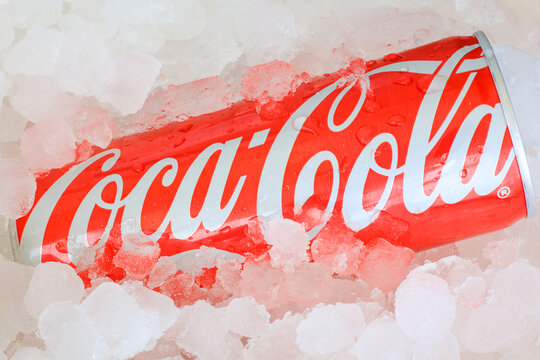 Coca Cola - original coca cola in drops and ice cubes 