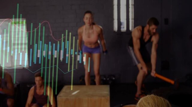 Lead woman guiding fitness, group doing box jumps, ball slams, hammer hits, equalizer syncing reps