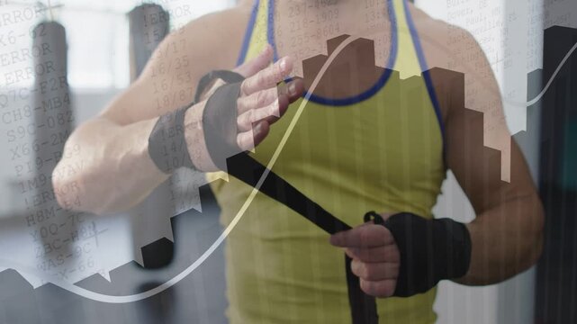 Man wrapping wrist, knuckles in gym, preparing for boxing while bar and line graphs overlay scene