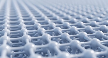 Obraz premium A close-up view of a light blue interconnected grid structure with shallow depth of field, resembling a molecular lattice or advanced material.