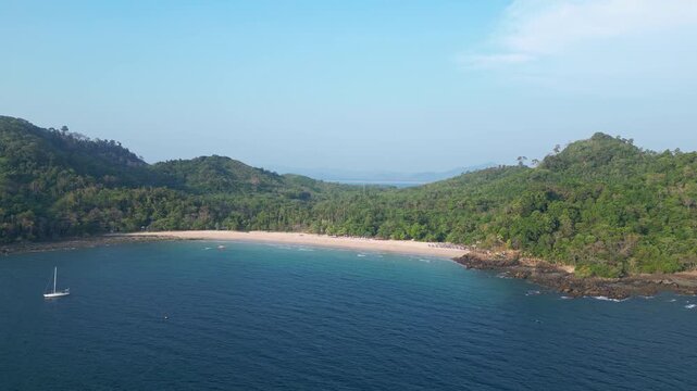 Koh Muk, Thailand: Aerial forward drone footage of the Farang or Charlie beach in the wild and beautiful Koh Muk, Mook, in the Andaman sea in Trang province in southern Thailand. 