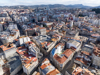 Obraz premium Aerial view of Vigo city center in Pontevedra, Galicia, Spain. Coastal city on the Ria de Vigo inlet, Capital Comarca.