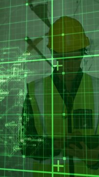 Vertical video: Inspector tapping tab on building site, checking plans while green HUD around hands