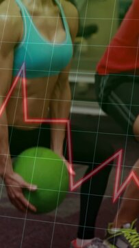 Vertical video: Pink arrow appearing, woman holding green ball lowering into squat for fitness