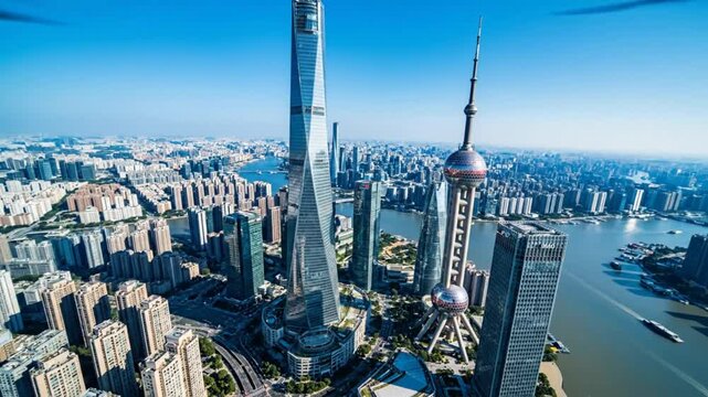 Aerial view of Shanghai China's Pudong skyline featuring iconic skyscrapers and cityscape on a clear, sunny day