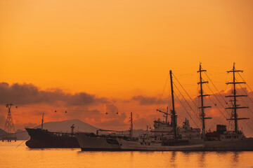 Obraz premium Vietnamese warships military ships in a port at sea in morning at dawn in harbor in Nha Trang in Vietnam