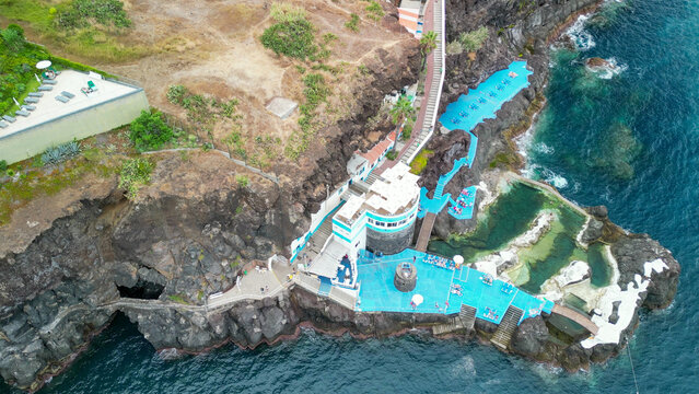Doca do Cavacas aerial drone view of natural pools and cliffs in Madeira Portugal