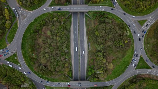 Top down aerial view of heavy traffic at Flagstaff Island roundabout near Ashby-de-la-Zouch UK