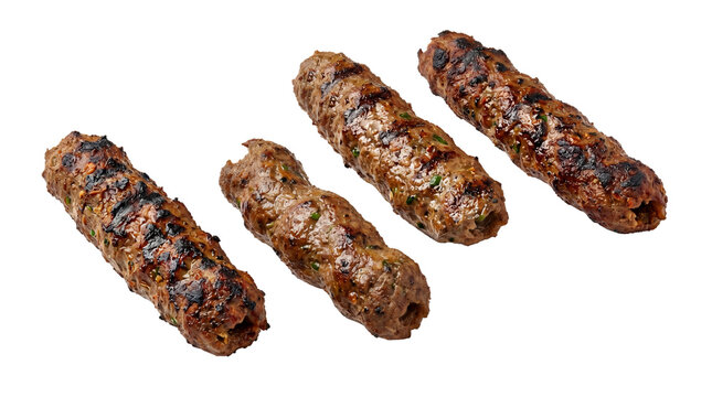 Grilled beef kofta kebabs, traditional middle eastern minced meat skewers, roasted lamb lula kebab with charred texture and herbs isolated PNG with Transparent Background