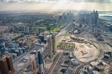 Drone-style aerial view of Dubai cityscape from helicopter in United Arab Emirates
