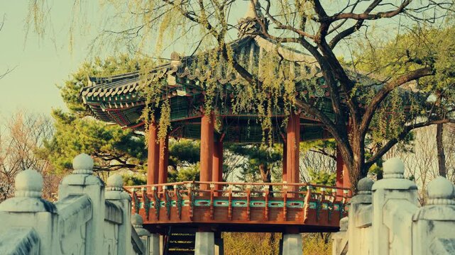octagonal pavilion, traditional asian architecture, classic wooden gazebo, cultural heritage site