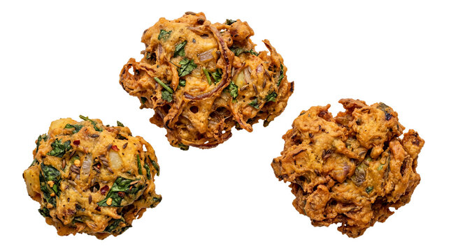 Crispy vegetable pakora snacks, golden fried onion bhaji fritters with spinach, traditional Indian appetizers and savory street food isolated PNG with Transparent Background