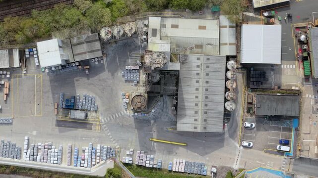 Aerial drone view of a massive brick and concrete manufacturing plant in Swadlincote UK