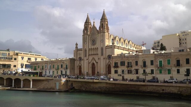 The neo-gothic Balluta Parish Church and Carmelite Convent in St Julian's, Malta.