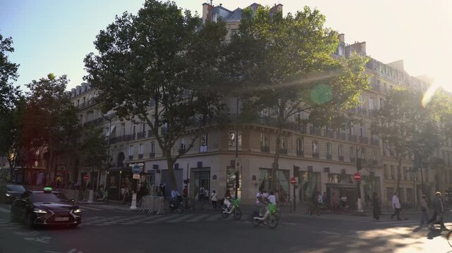 Historic Parisian buildings at the intersection of Boulevard Saint Germain and Saint Michel in Paris at sunset.