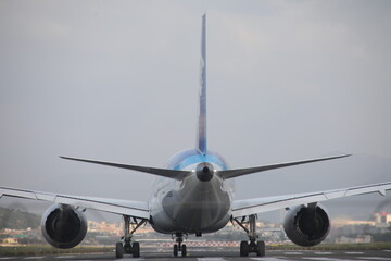 Naklejka premium Dreamliner taxiing on runway