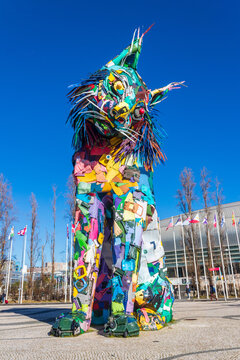 The huge cat sculpture Iberian lynx by artist Bordalo II  created in 2019 from recycled materials and garbage at Park of Nations in Lisbon, Portugal