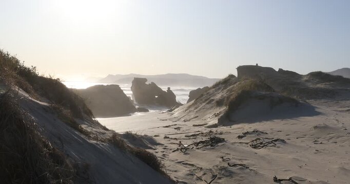 teenage girl overlooking beautiful rocky coastline, Sopies Klip, Hermanus, South Africa