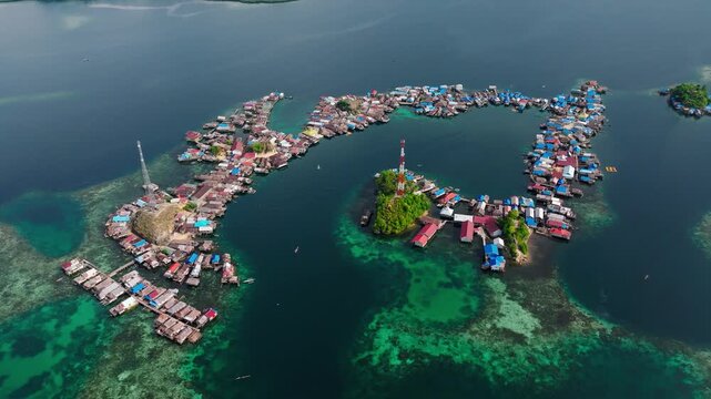 Drone View Over Kepulauan Kabalutan Village and Blue Lagoon &ndash; Togean Island Indonesia