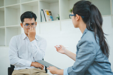 Fototapeta premium Psychologist listening to the problem of a patient with mental health problems, a patient for treatment encouragement Love and family problems, bipolar, depressed patients prevent suicide