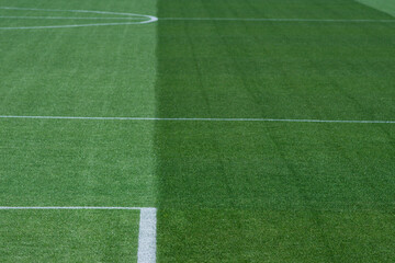 Obraz premium High-Resolution International-Standard Football Pitch with Contrasting Striped Turf for Background Use