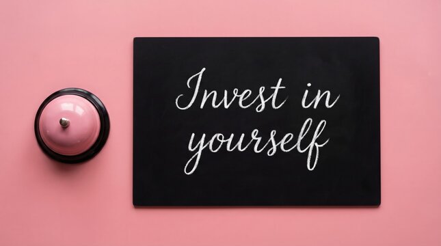 Invest in Yourself Pink bell with motivation note.