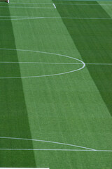 Fototapeta premium High-Resolution International-Standard Football Pitch with Contrasting Striped Turf for Background Use