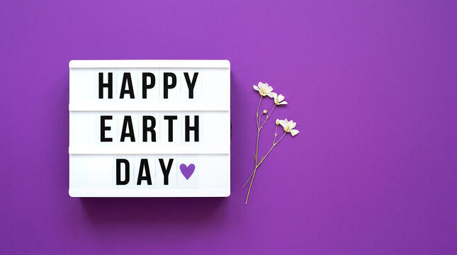 Minimal Earth Day Lightbox Flat Lay with Purple Background. Clean Copy Space Design with Bold Message and Floral Accent.