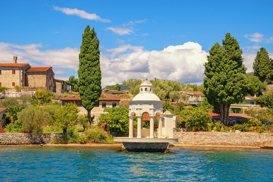 Montenegro,  Bay of Kotor. Coast of Miholjska Prevlaka Island or Flower island. View of ancient Monastery of Saint Archangel Michael from sea