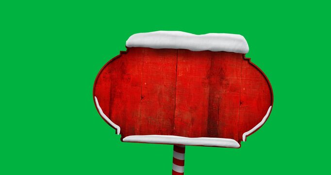 Digital animation of snow over red wooden sign post with copy space against black background
