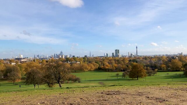 London city skyline view from Primrose Hill with autumn colors in Regent's Park