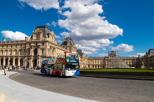 City Sightseeing Hop on Hop off double decker bus near Louvre museum in Paris, France