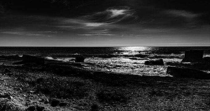 Moody Ocean Horizon with Dramatic Sky in Black and White
