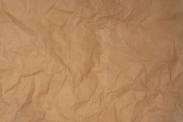 Fototapeta premium Crumpled paper as background. Top view.