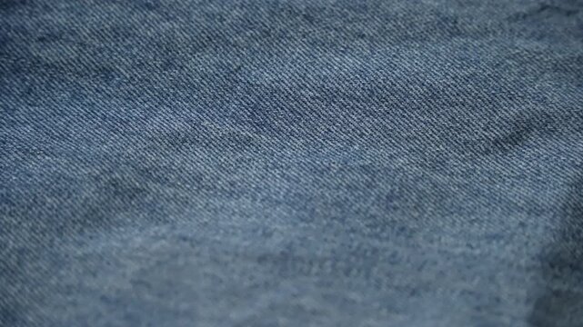 Denim jeans. Fabric texture. Denim trousers.