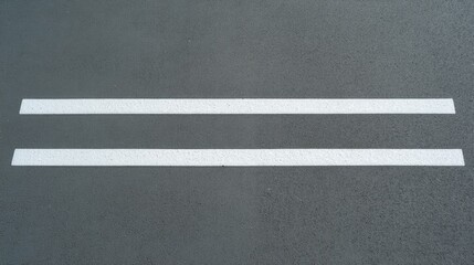 Fototapeta premium Clean and Minimalistic Gray Asphalt Surface with Two Parallel White Lines Marking a Road for Transportation or Pedestrian Guidance