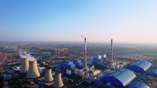 Aerial dusk view of a 220 kV thermal power plant in Hohhot, Inner Mongolia, China.