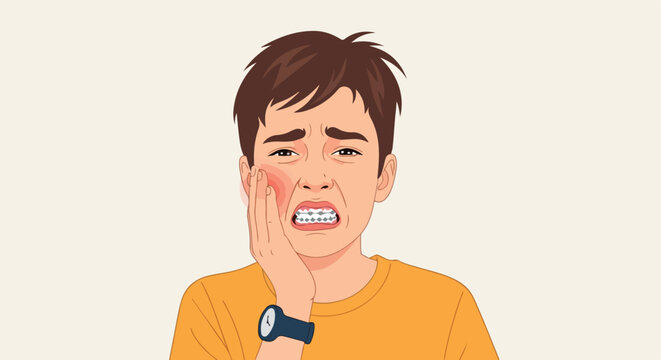 Young man in a yellow shirt with braces touching his cheek due to a toothache