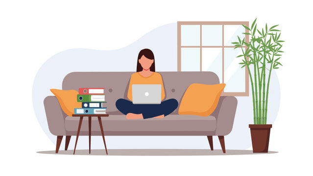 woman sitting comfortably on a sofa with a laptop and a stack of folders while working from home during the day.