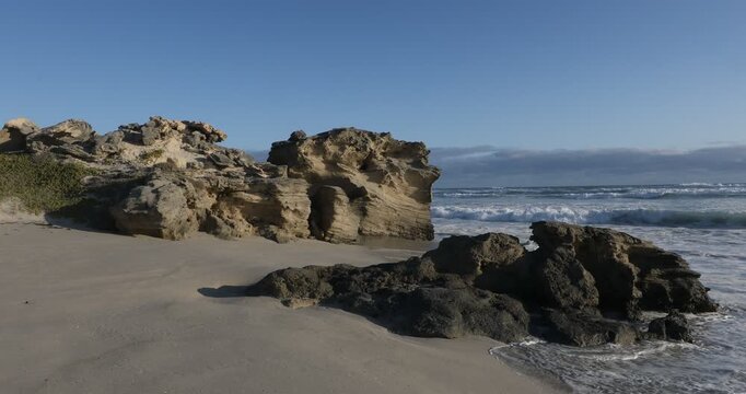 teenage girl overlooking beautiful rocky coastline, Sopies Klip, Hermanus, South Africa