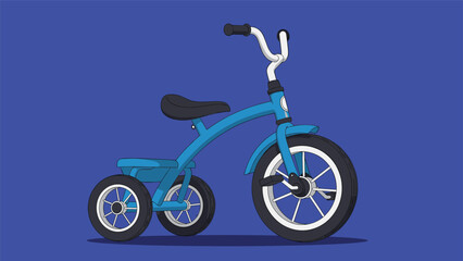 Fototapeta premium Stylish blue childs tricycle with white wheels and black seat shown in profile on a dark blue background.