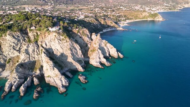 Summer aerial panorama of Calabria Capo Vaticano coastline with clear waters and coastal scenery