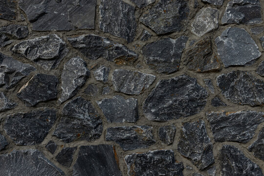 Dark stone wall texture background