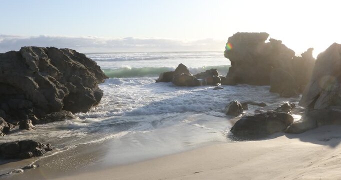 teenage girl overlooking beautiful rocky coastline, Sopies Klip, Hermanus, South Africa