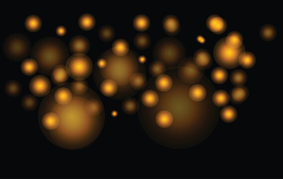 Abstract bokeh lights a dark background with warm blurry orbs