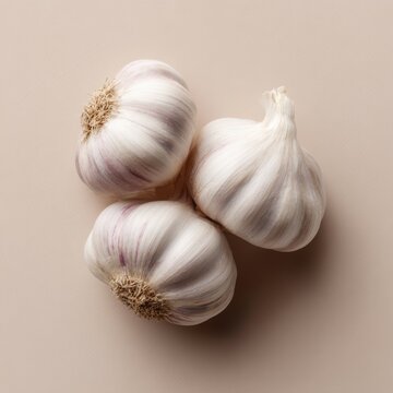 Fresh garlic bulb with cloves and papery skin texture, cooking ingredient concept