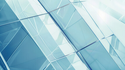 Fototapeta premium Light reflects off a collection of glass panels in a modern building during daylight hours in a city setting